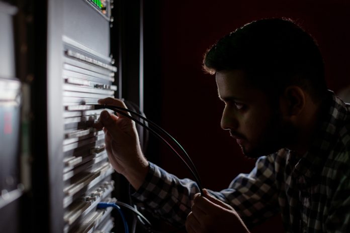 man working on a server